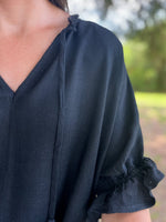 Load image into Gallery viewer, Carson Ruffle Hem Blouse :: Black :: L-1X
